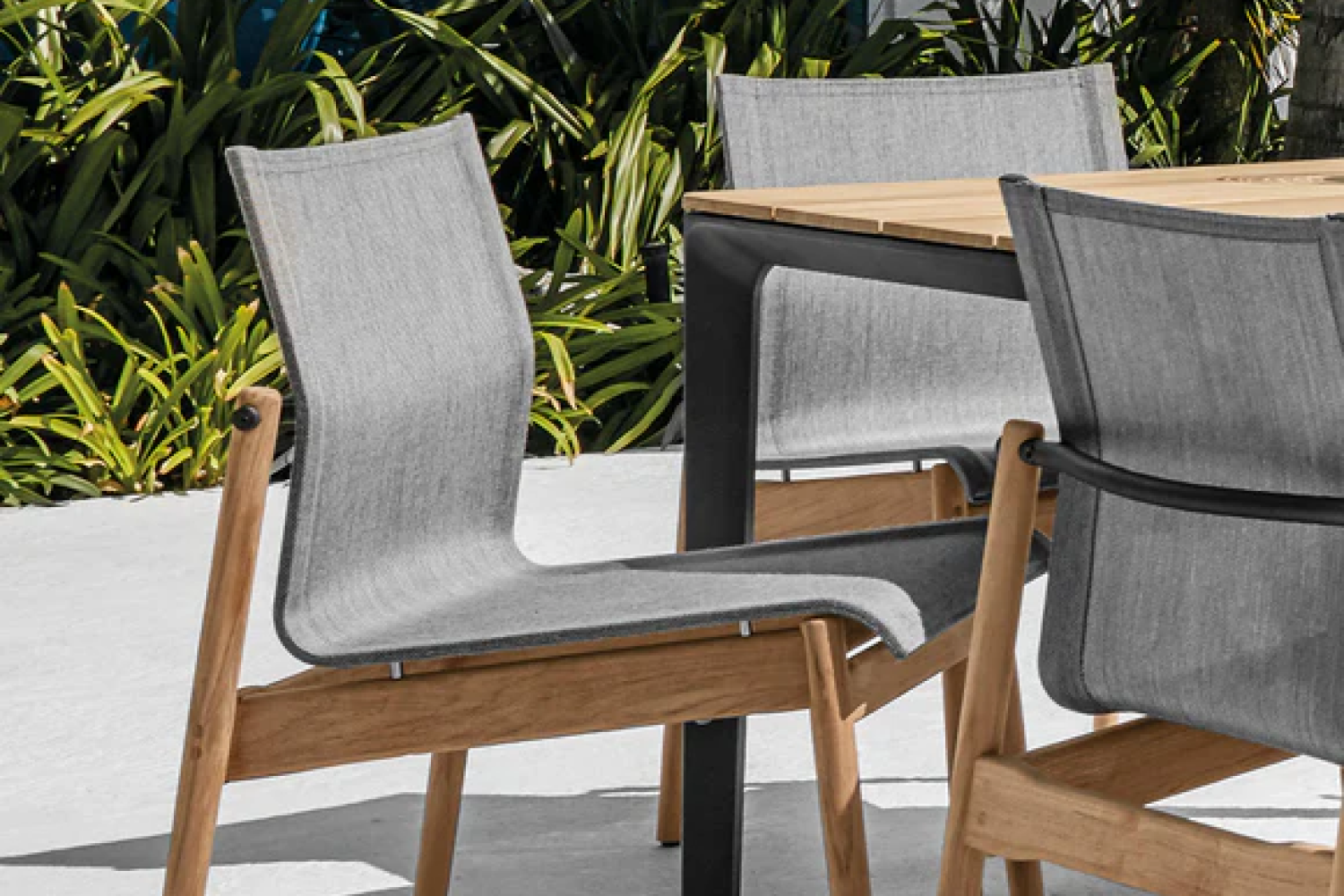 sway_teak_stacking_dining_chair_03_1x